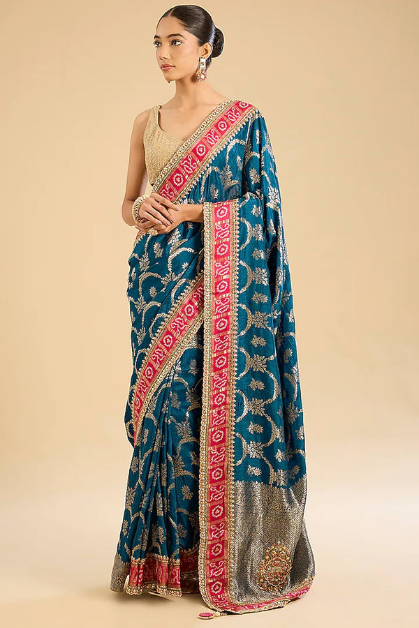 The Sapphire Song: Peacock Blue Georgette Saree with Zari Work
