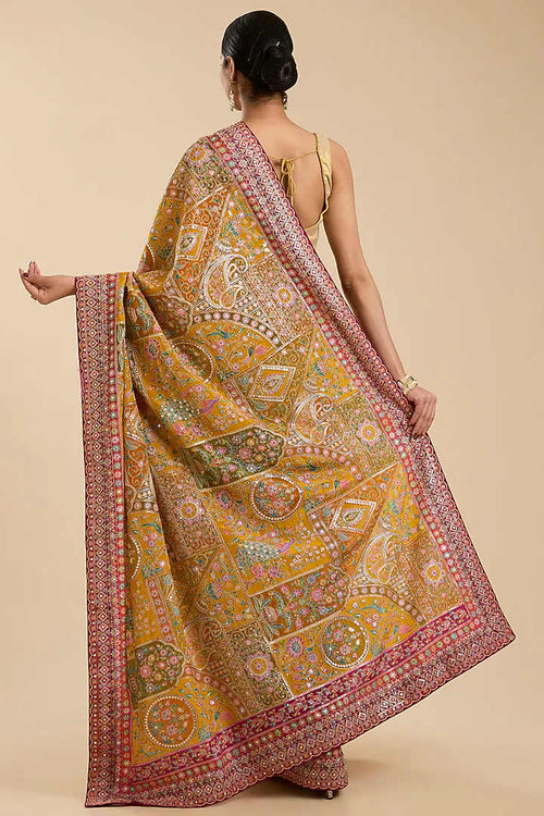 The Golden Bloom: Yellow Crepe Silk Saree with Zari Sequin Ambi Floral Work