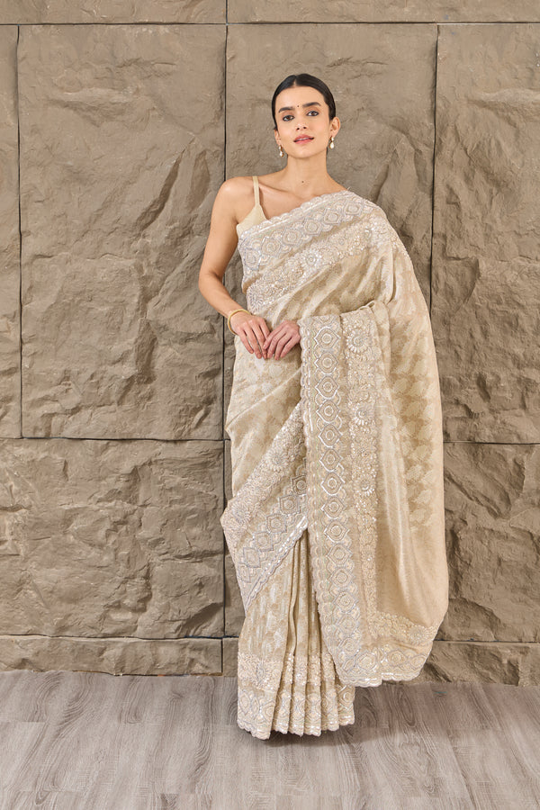 The Pearl Brocade: Cream Saree with Sequin and Pearl Embellishments