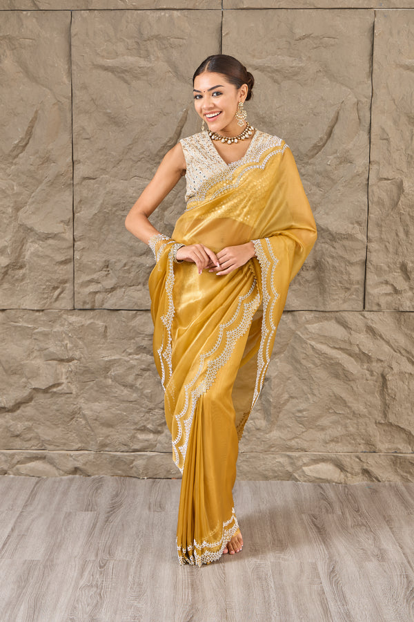 The Amber Muse: Mustard Saree with Intricate Zarkan and Cutwork Detailing