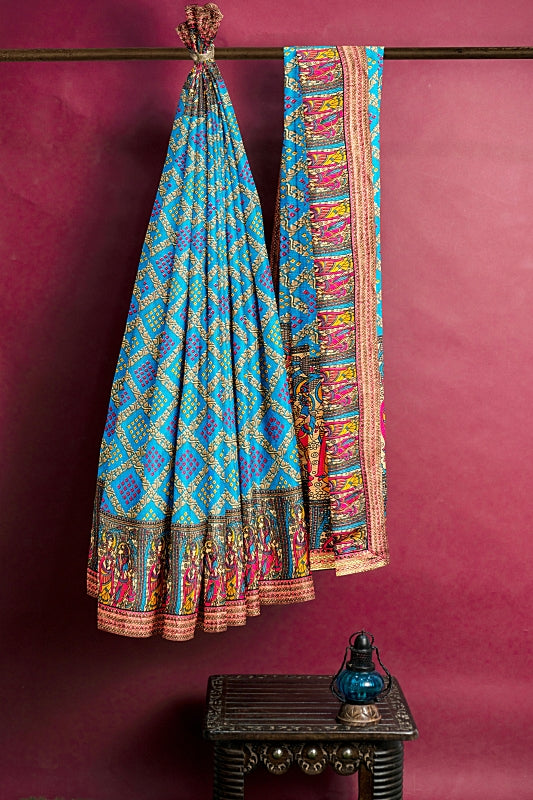 The Pure Devotion: Radha Krishna Motif Border Blue Georgette Bandej Saree