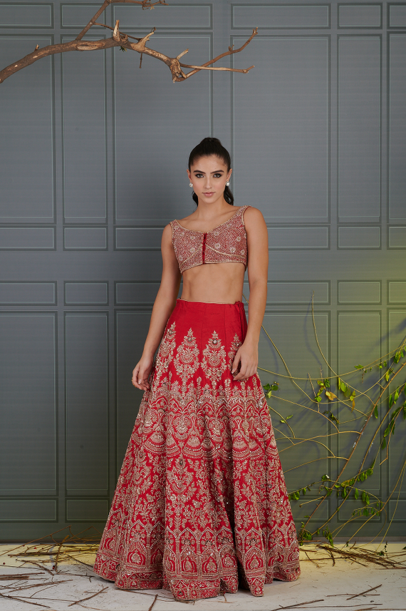 Glamorous Carrot Red Color Embroidery Work Base Lehenga Choli